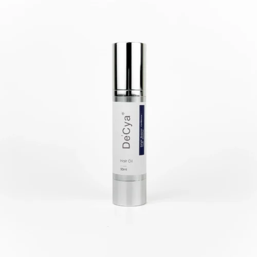 Hair Oil in a sleek bottle by a renowned shampoo manufacturer in Malaysia, delivering OEM hair shampoo products solutions