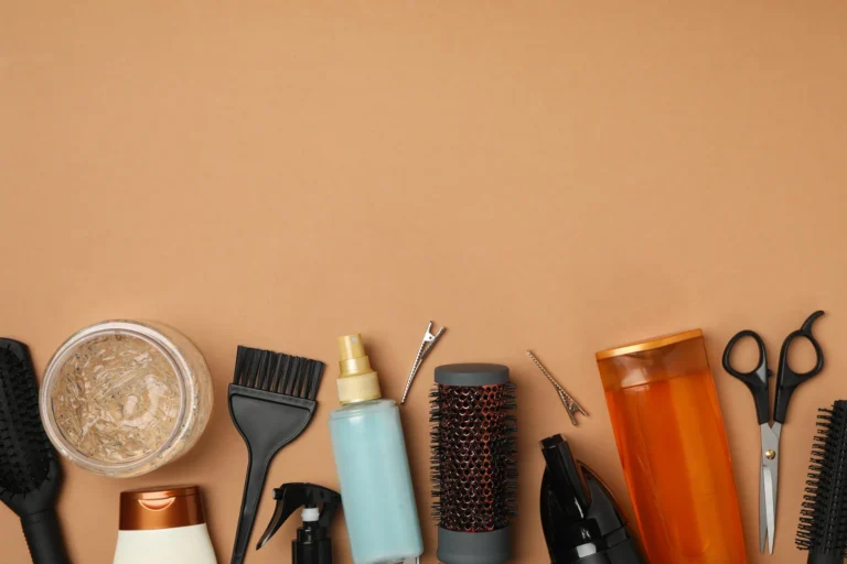 Hairdresser accessories displayed alongside OEM shampoo products from a manufacturer in Malaysia.